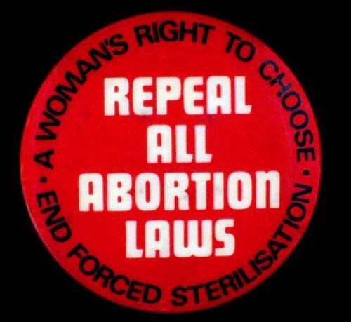 Button. 'a woman's right to choose . end forced sterilisation. '.