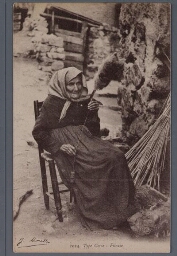 Franse vrouw spint garen. 1923