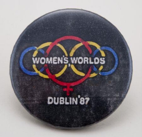 Button. Women's World
