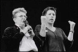 Tijdens Europride spreekt Annemarie Grewel, naast haar een doventolk. 1994