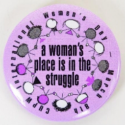 Button. 'A woman's place is in the struggle'.