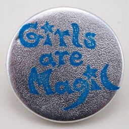 Button. 'Girls are Magic'.