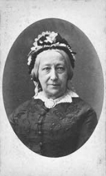 Portret van Anna Wolterbeek, mede-oprichter van de Algemeene Nederlandsche Vrouwenvereeniging 'Tesselschade'. 188?
