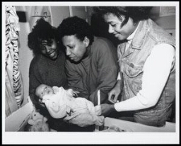 Drie zwarte vrouwen met een baby 1994