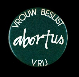 Button. 'vrouw beslist abortus vrij'.