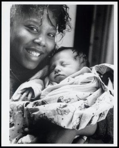 Zwarte vrouw met baby 1994