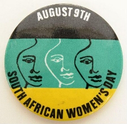 Button. 'August 9th South African Women's Day'.
