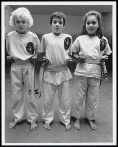 Drie kinderen in judopakken 1995